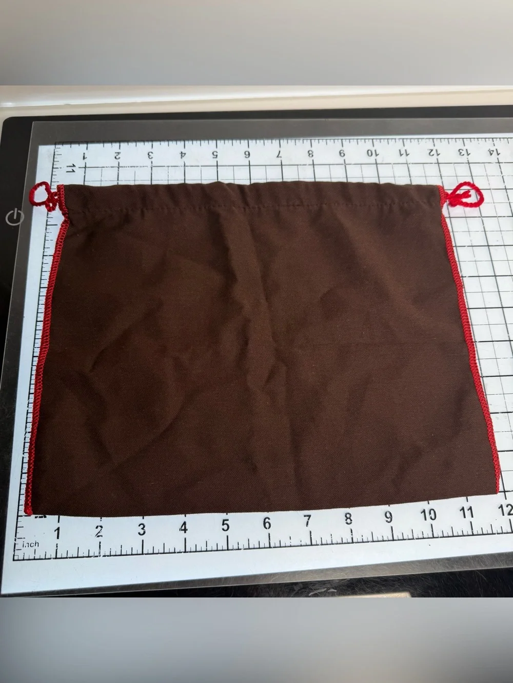 COACH Brown Drawstring Dust Bag with Red Trim. 12 by 9 inches